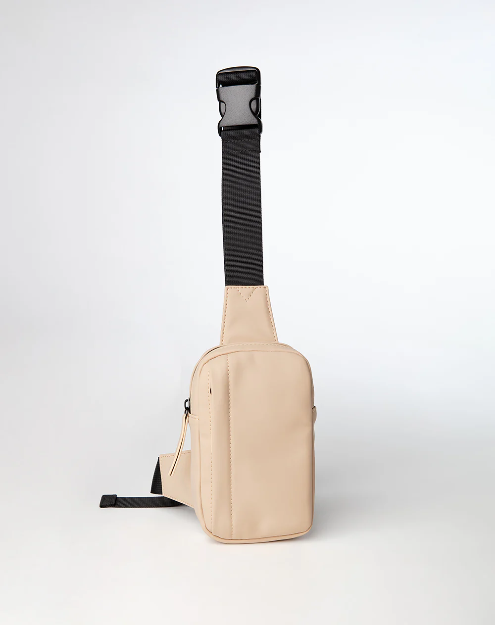 Bolso cruzado tipo sling bag beige hombre