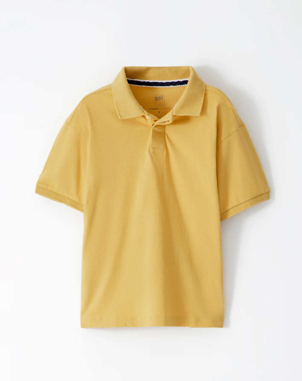 Polo regular algodón mostaza niño