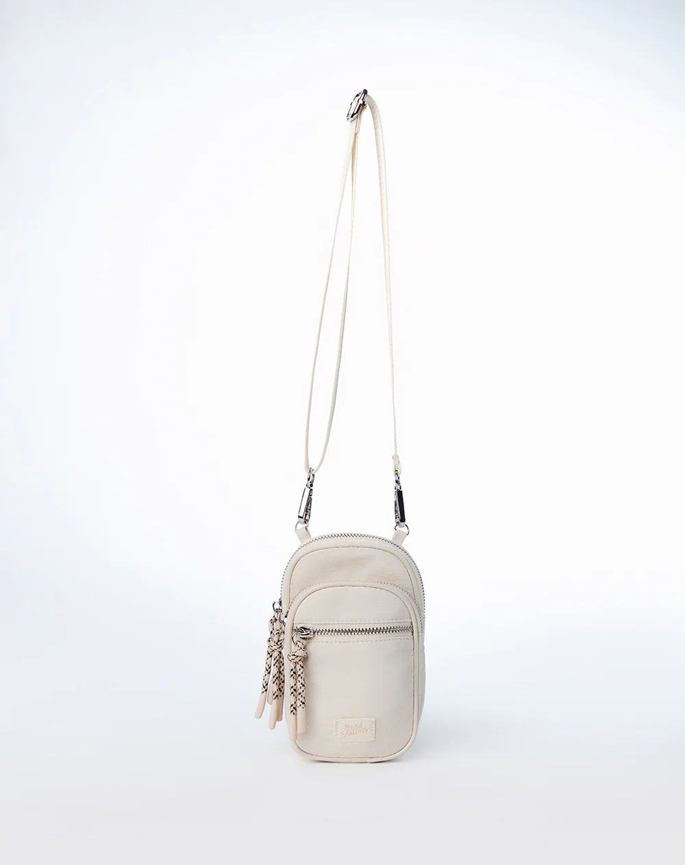Bolso tipo bandolera beige niña