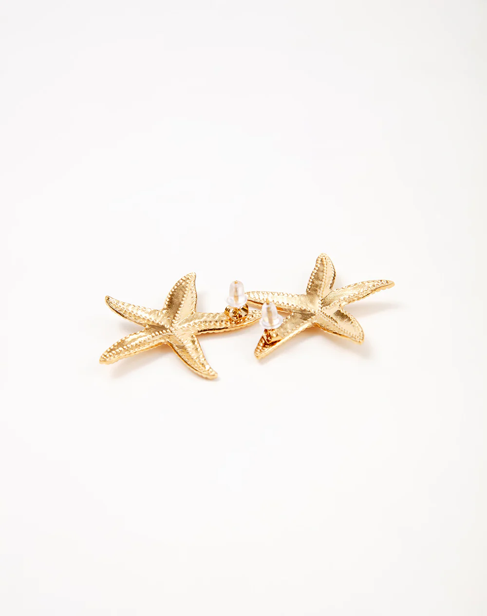 Aretes estrellas dorados mujer - Image 3
