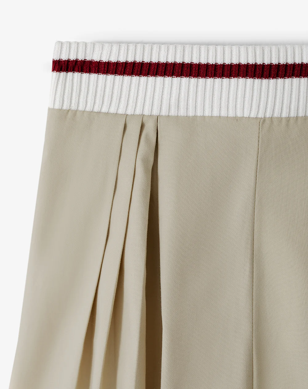 Falda corta con pliegues beige niña - Image 7